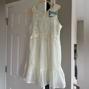 Brand new, with tags detailed cream dress